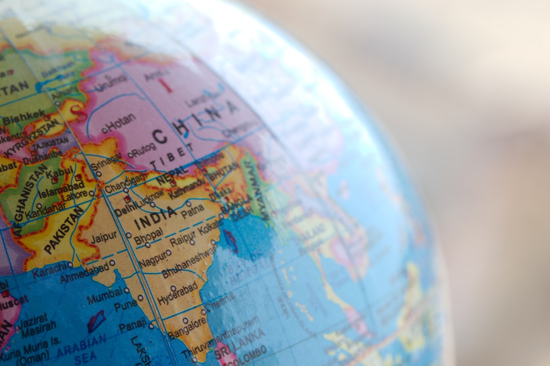 blue and brown world map globe